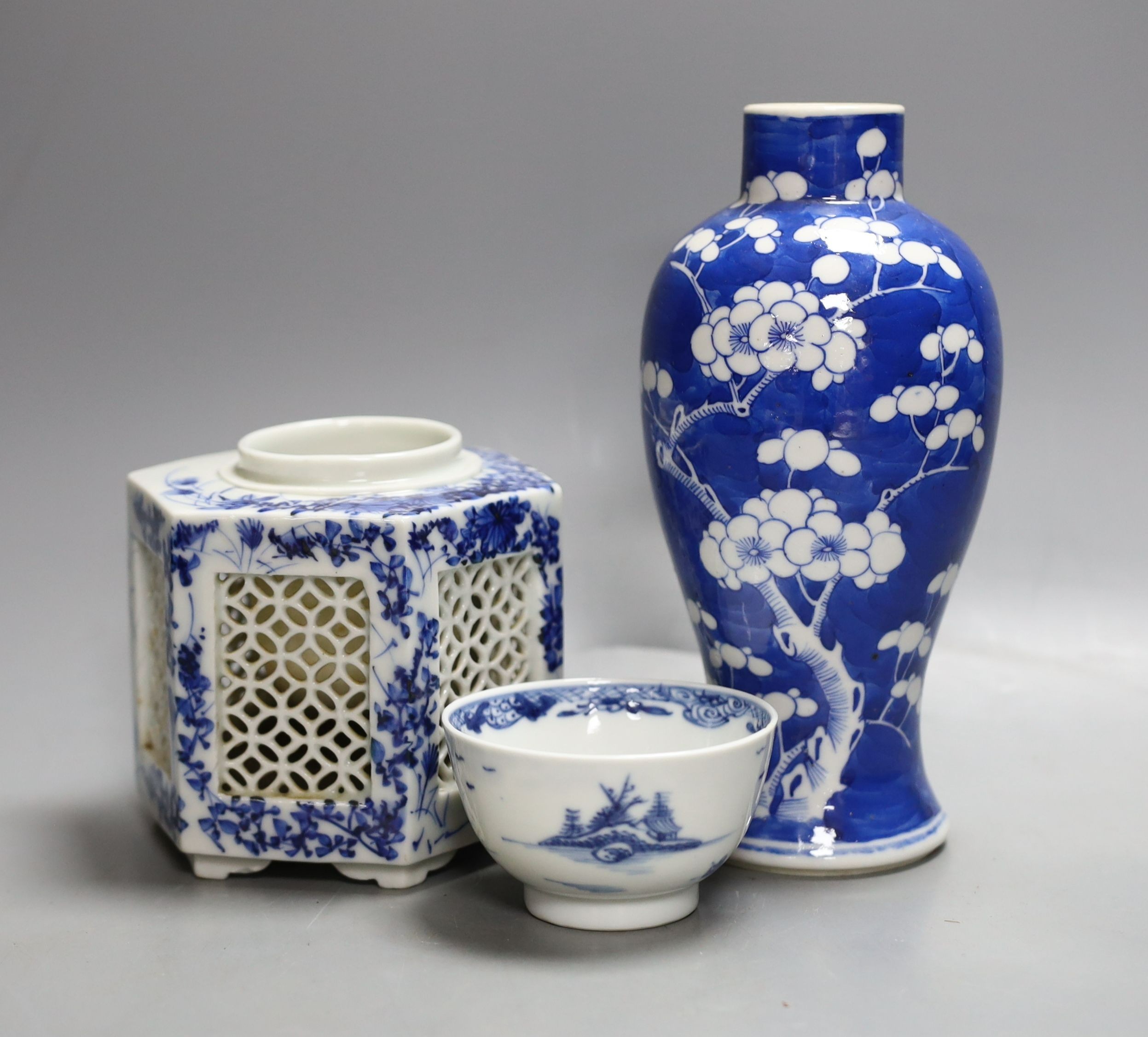 A Chinese blue and white prunus vase, four character mark, height 19cm and two other blue and white items (3)